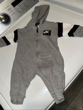 Nike Grey Hooded Baby One-Piece Romper with Black & White Sleeve Stripes